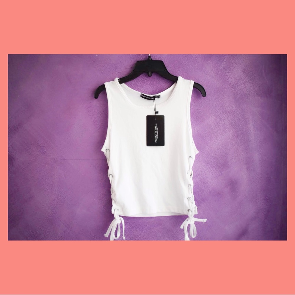 Pretty Little Thing white Lace-up side vest.